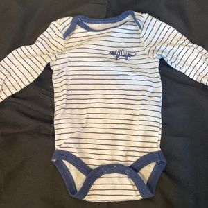 3-6 months long sleeve white onesie with navy stripes and dinosaur